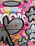 Rainbow Hoops - Bunny tags on faded cereal packet in ornate frame